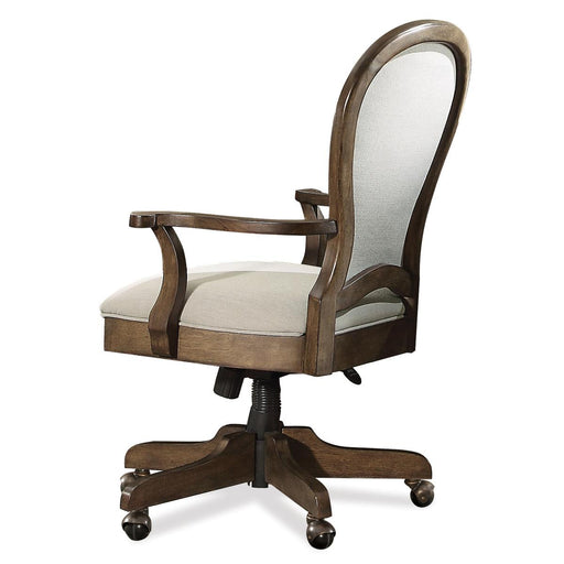 Riverside Belmeade Round Back Upholstered Desk Chair in Old World Oak image
